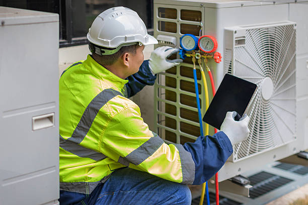 Professional Air Conditioning Repair technician working in French Camp, CA